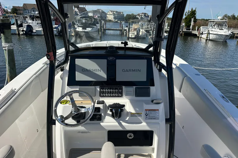  Yacht Photos Pics 2021 Sea Fox 288 Commander boat dashboard with dual Garmin displays at marina.