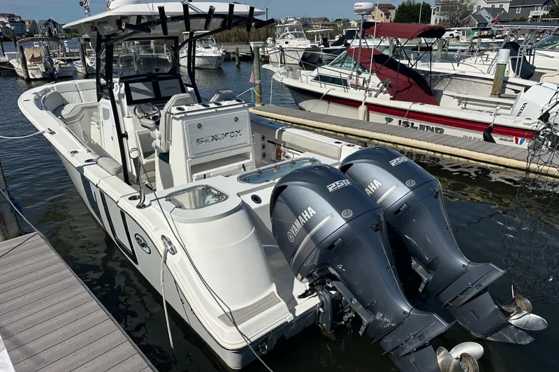  Yacht Photos Pics 2021 Sea Fox 288 Commander boat with twin Yamaha 250 engines docked at marina.