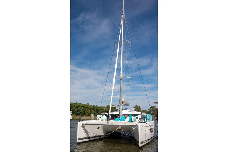 Sweet And Salty Yacht Photos Pics 2018 Fountaine Pajot Helia 44 Evolution catamaran on water, clear sky background.