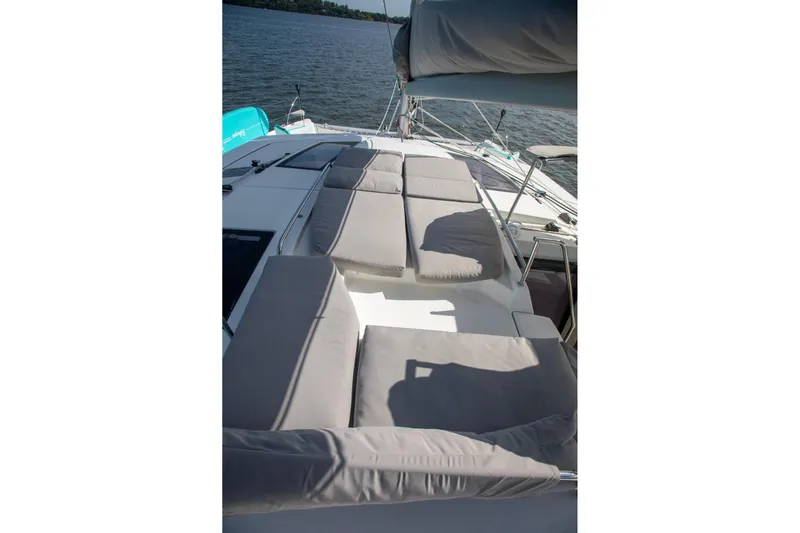 Sweet And Salty Yacht Photos Pics 2018 Fountaine Pajot Helia 44 Evolution catamaran with spacious deck and cushioned seating.