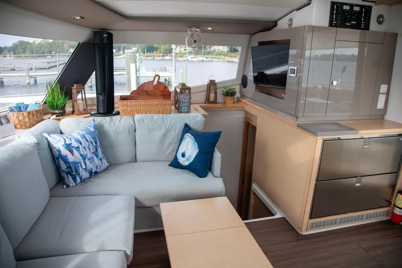 Sweet And Salty Yacht Photos Pics Luxurious interior of 2018 Fountaine Pajot Helia 44 Evolution catamaran with modern furnishings.