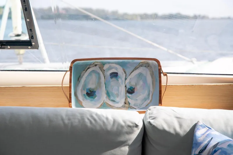 Sweet And Salty Yacht Photos Pics Interior of 2018 Fountaine Pajot Helia 44 Evolution with decorative oyster painting.