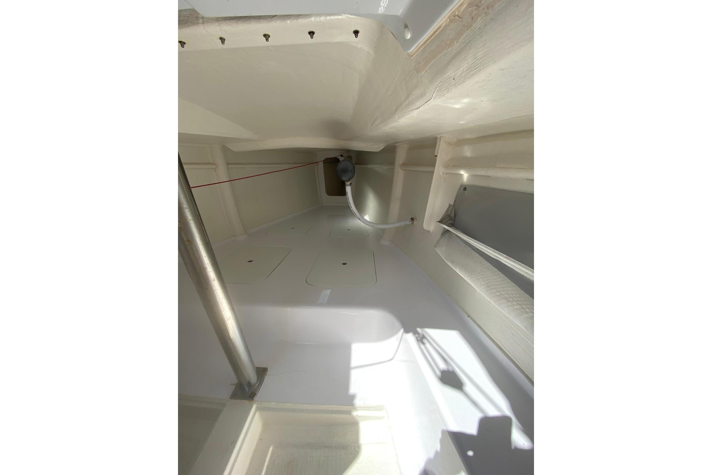 Interior view of 2020 Esse 850 LE sailboat, showcasing sleek, minimalist design.