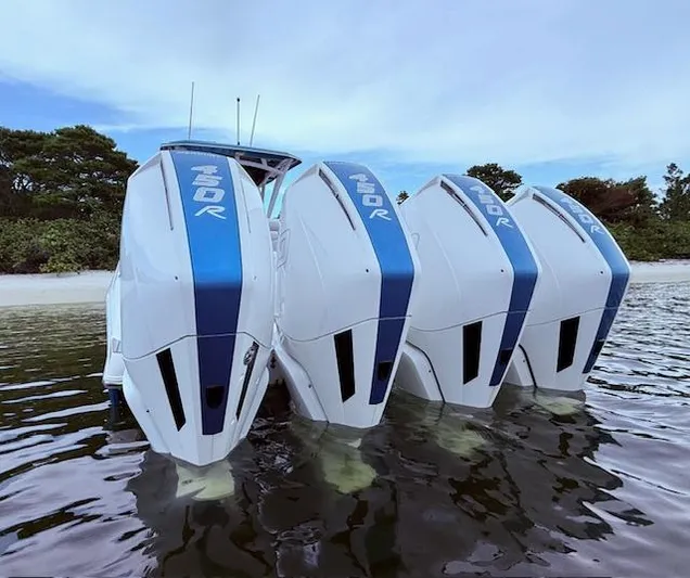  Yacht Photos Pics 2022 Nor-Tech 390 Sport Center Console with quad 450R outboard engines in shallow water.