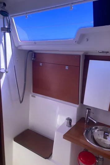 Caff&Eacute; Latte Yacht Photos Pics Interior of 2013 Dufour 410 Grand Large yacht bathroom with shower and sink.