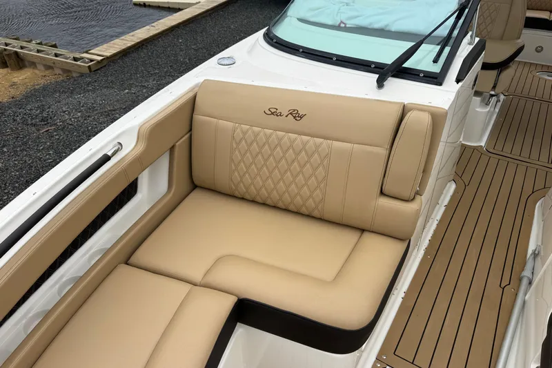  Yacht Photos Pics 2021 Sea Ray SLX 310 boat with tan leather seating and elegant interior design.