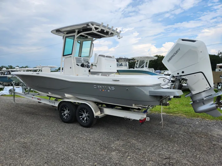 Beautiful Caymas! Yacht Photos Pics 2024 Caymas 28 HB boat on trailer, side view.