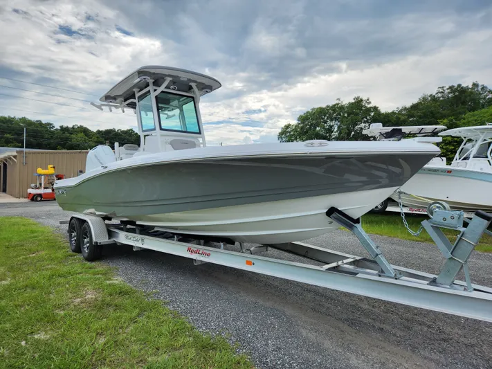 Beautiful Caymas! Yacht Photos Pics 2024 Caymas 28 HB boat on trailer, cloudy sky.