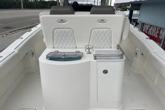  Yacht Photos Pics 2023 World Cat 280 CC-X boat interior with seating and storage compartments.
