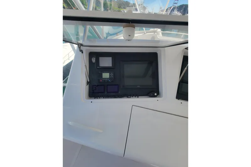  Yacht Photos Pics Control panel of 2012 Viking 64c yacht with navigation screens and instruments.