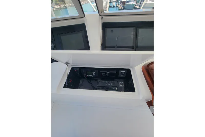  Yacht Photos Pics Control panel of 2012 Viking 64c yacht, featuring navigation and communication equipment.