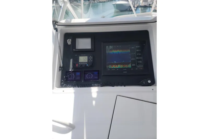  Yacht Photos Pics Control panel of a 2012 Viking 64c yacht with navigation and communication equipment.