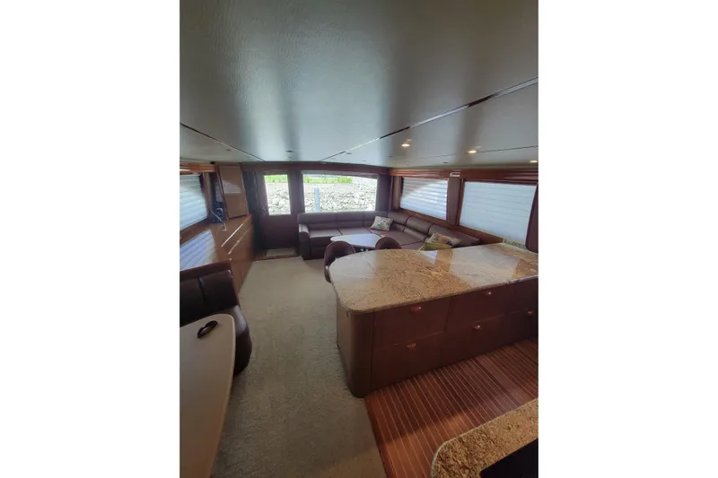  Yacht Photos Pics Luxurious interior of 2012 Viking 64c yacht with elegant seating and modern design.