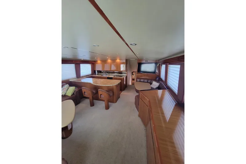  Yacht Photos Pics Luxurious interior of 2012 Viking 64c yacht with elegant wood finishes and modern amenities.