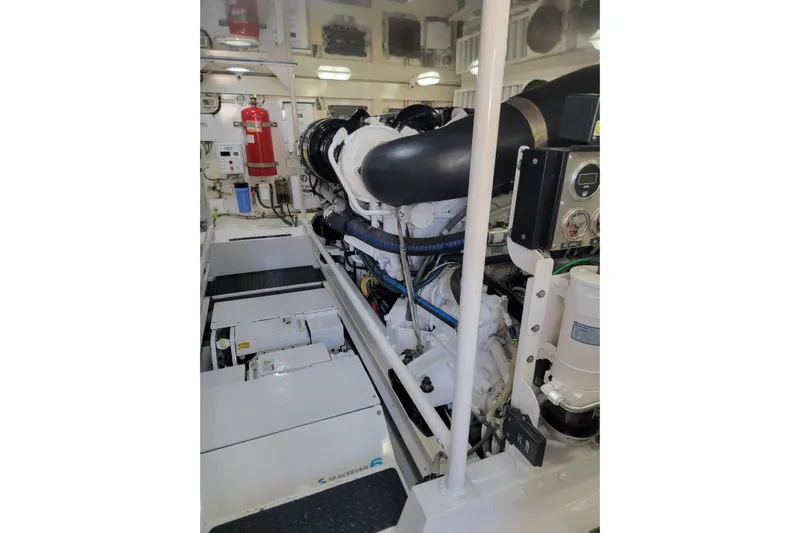  Yacht Photos Pics Engine room of a 2012 Viking 64c yacht, featuring advanced machinery and equipment.