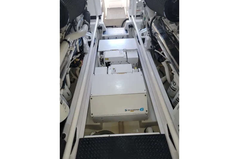  Yacht Photos Pics Engine room of 2012 Viking 64c yacht featuring Seakeeper 6 stabilizer system.