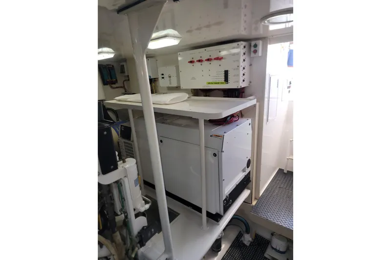  Yacht Photos Pics Engine room of 2012 Viking 64c yacht with electrical equipment and control panels.