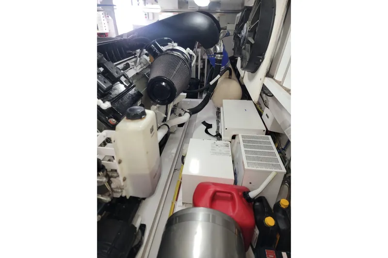  Yacht Photos Pics Engine room of a 2012 Viking 64c yacht with various mechanical components.