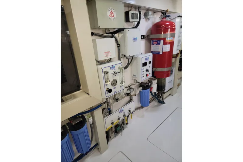  Yacht Photos Pics Engine room equipment in a 2012 Viking 64c yacht, featuring control panels and safety systems.