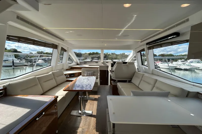  Yacht Photos Pics Luxurious interior of 2018 Sea Ray Fly 520 yacht with spacious seating and elegant design.