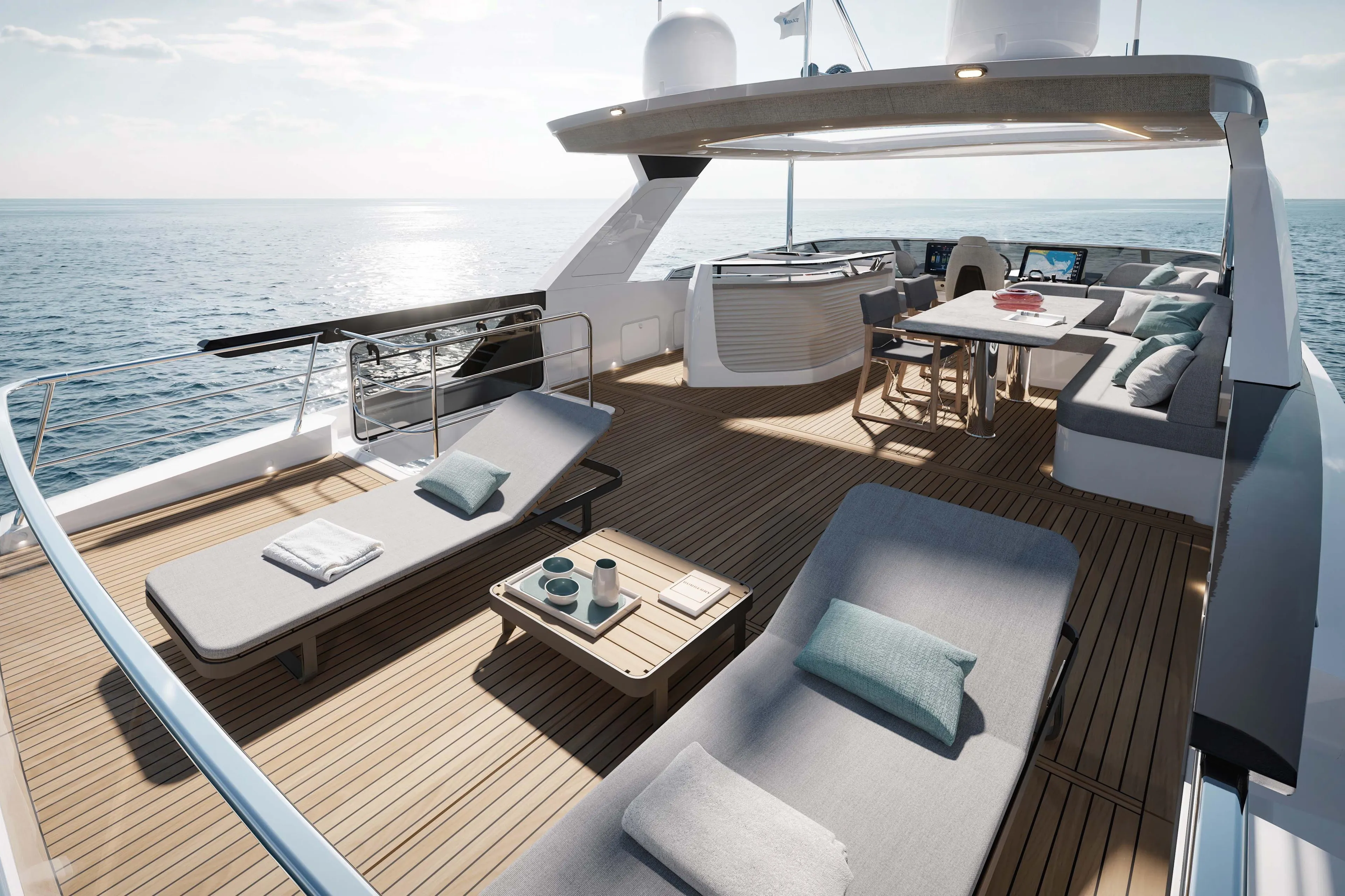 Luxurious 2026 Absolute Navetta 66 yacht deck with sun loungers and dining area.