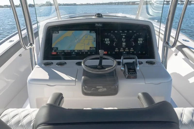  Yacht Photos Pics 2026 Mag Bay 43 CC helm with advanced navigation display and controls.