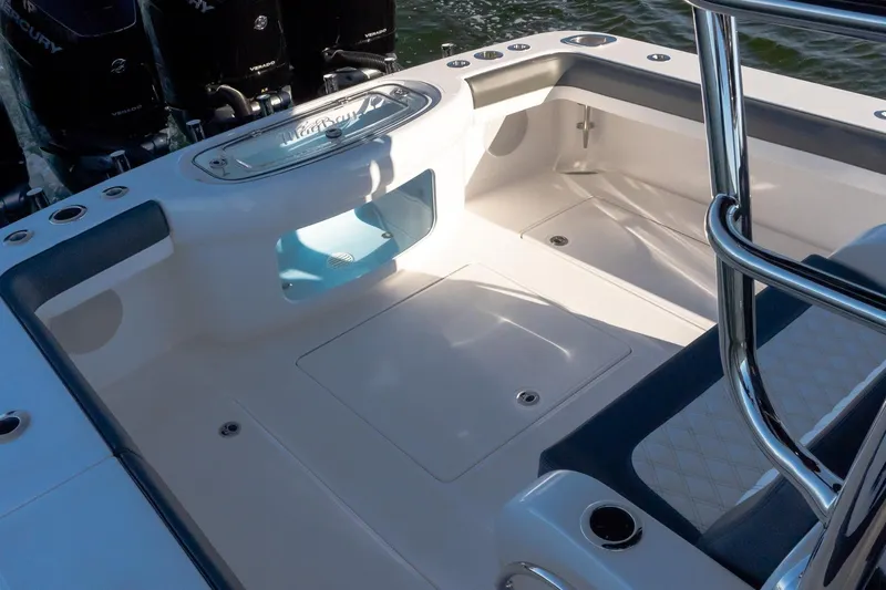  Yacht Photos Pics 2026 Mag Bay 43 CC boat deck with seating and storage compartments.