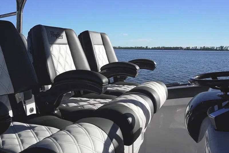  Yacht Photos Pics Luxurious seating on 2026 Mag Bay 43 CC boat with ocean view.