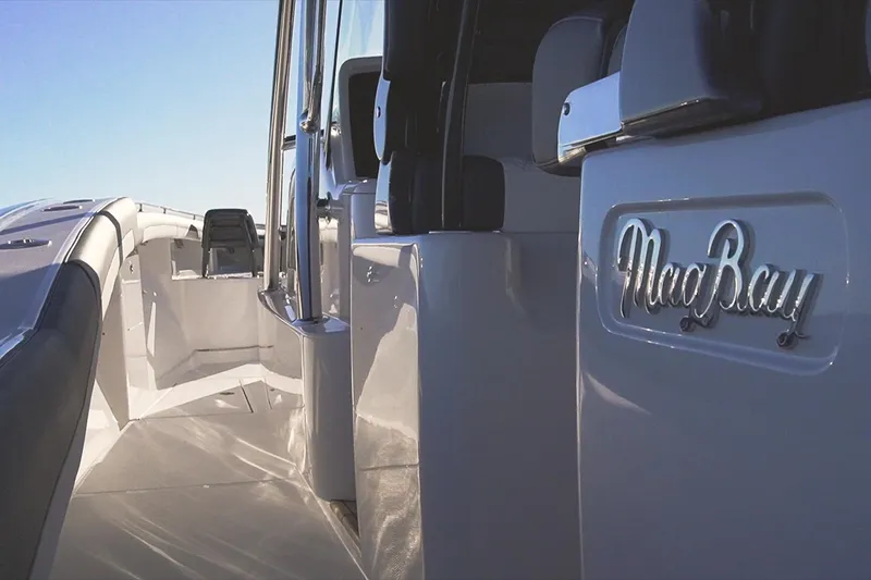  Yacht Photos Pics 2026 Mag Bay 43 CC boat interior with sleek design and logo detail.