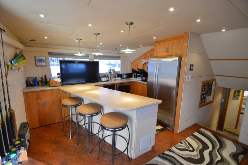 Custom Yacht Photos Pics Interior of a 2004 Chesapeake 58 yacht with modern kitchen.