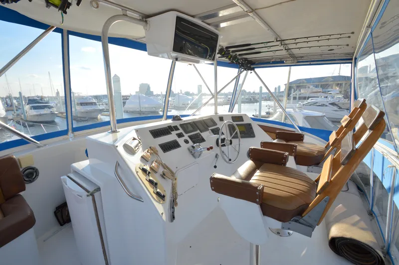 Custom Yacht Photos Pics 2004 Chesapeake 58 yacht helm station in harbor.
