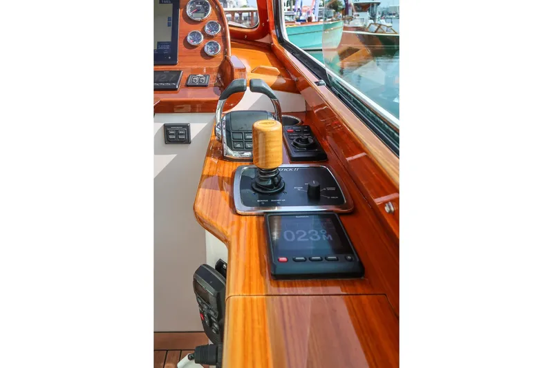 Bristol Yacht Photos Pics Hinckley Picnic Boat 37 MKIII 2015 helm with polished wood and modern controls.