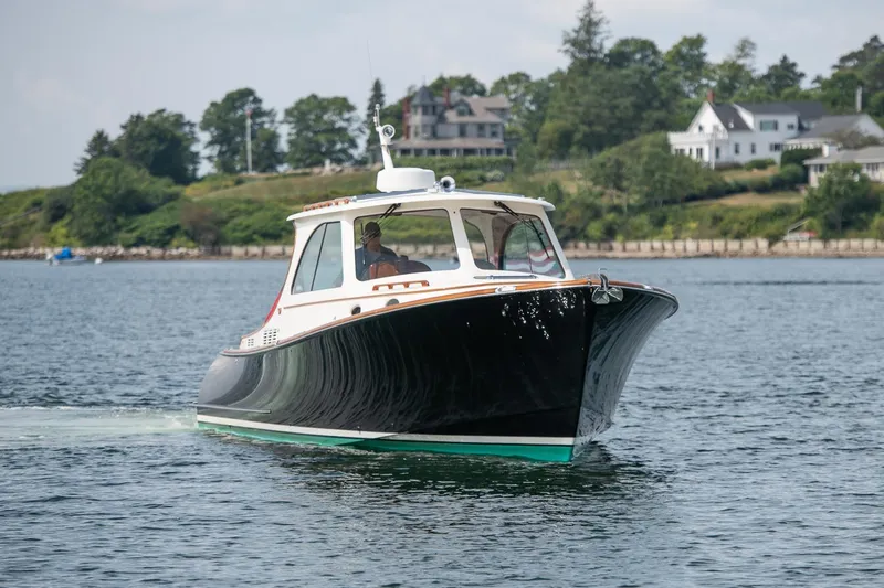 Bristol Yacht Photos Pics 2015 Hinckley Picnic Boat 37 MKIII cruising on a scenic waterway.