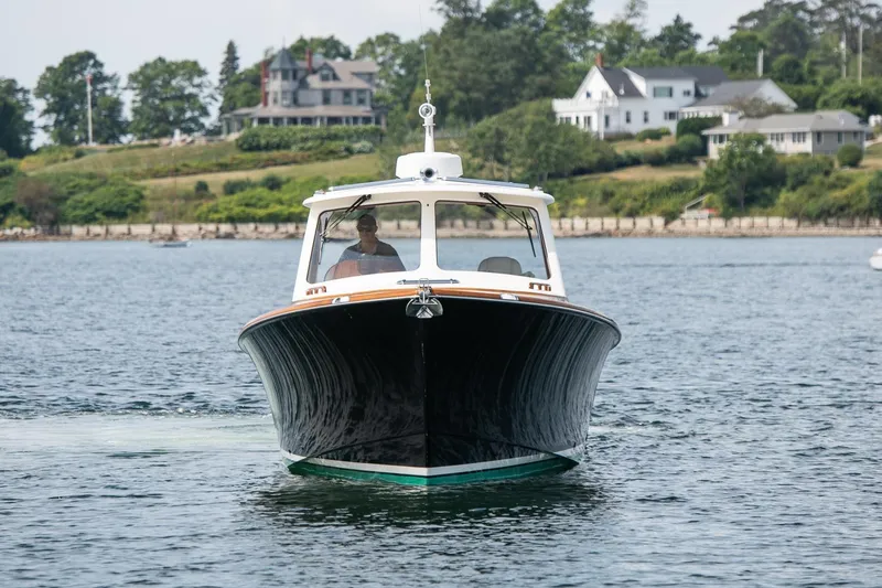 Bristol Yacht Photos Pics 2015 Hinckley Picnic Boat 37 MKIII cruising on a scenic waterway.