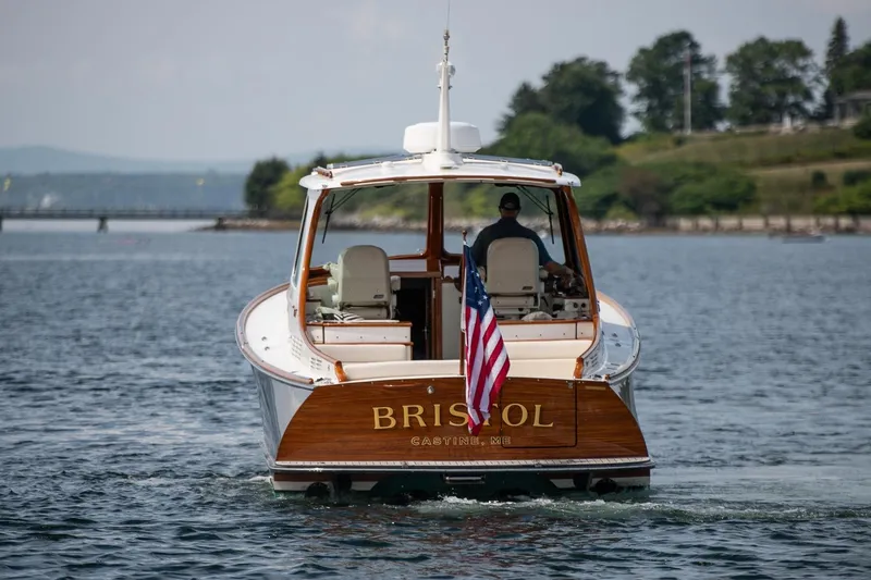 Bristol Yacht Photos Pics 2015 Hinckley Picnic Boat 37 MKIII cruising on a scenic waterway.