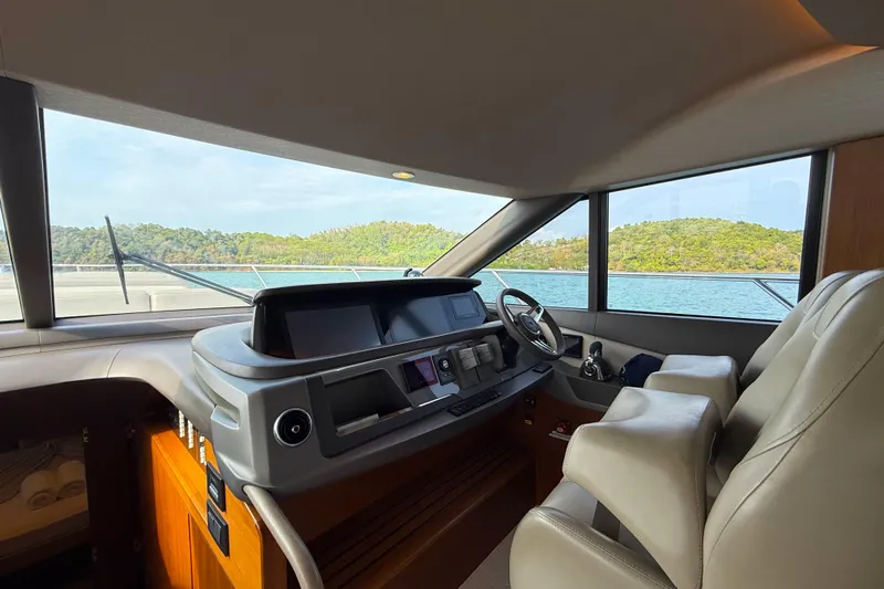 Lariel Yacht Photos Pics Luxurious 2020 Princess F55 yacht cockpit with scenic ocean view.
