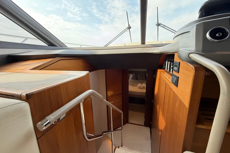 Lariel Yacht Photos Pics Interior of 2020 Princess F55 yacht, featuring elegant wood finishes and modern design.