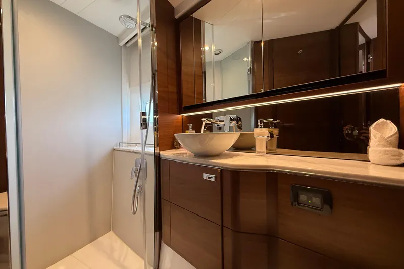 Lariel Yacht Photos Pics Luxurious bathroom in 2020 Princess F55 yacht with modern fixtures and elegant design.