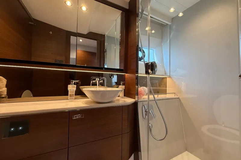 Lariel Yacht Photos Pics Luxurious bathroom in 2020 Princess F55 yacht with modern fixtures and elegant design.