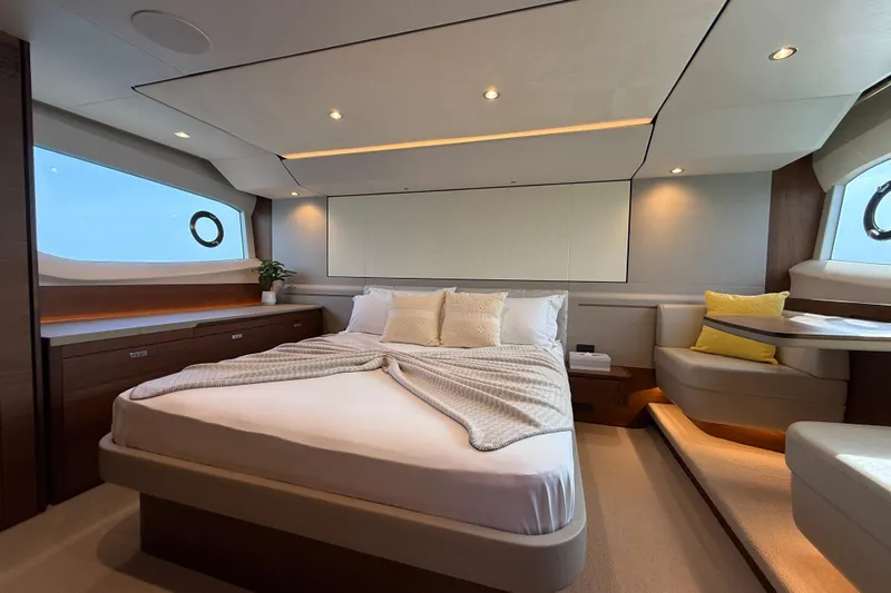 Lariel Yacht Photos Pics Luxurious 2020 Princess F55 yacht bedroom with modern design and elegant furnishings.