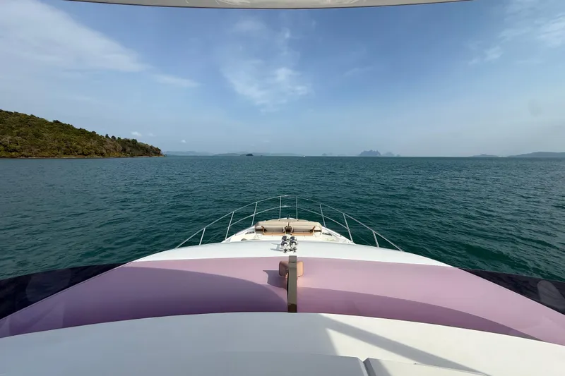 Lariel Yacht Photos Pics Luxury yacht Princess F55 cruising on open sea, 2020 model, scenic ocean view.