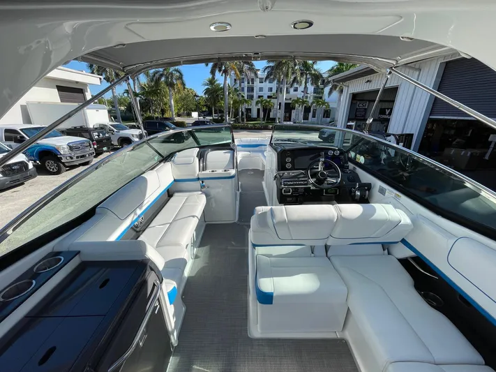  Yacht Photos Pics 2020 Formula 310 Bowrider interior with luxurious seating and modern dashboard.