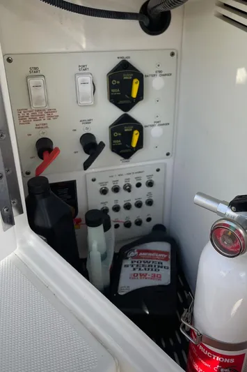  Yacht Photos Pics Control panel and supplies in a 2020 Formula 310 Bowrider boat.