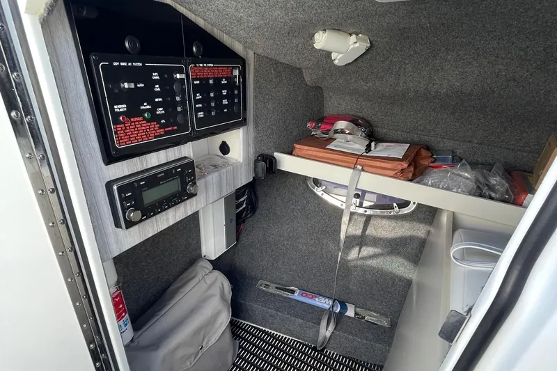  Yacht Photos Pics Interior cabin of 2020 Formula 310 Bowrider with control panels and storage.