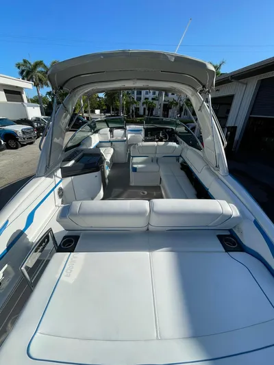  Yacht Photos Pics 2020 Formula 310 Bowrider boat with spacious seating and sleek design.