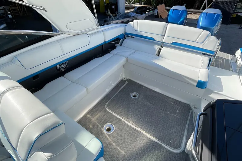  Yacht Photos Pics 2020 Formula 310 Bowrider interior with spacious white seating and modern design.