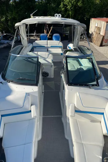  Yacht Photos Pics 2020 Formula 310 Bowrider boat with spacious seating and sleek design.