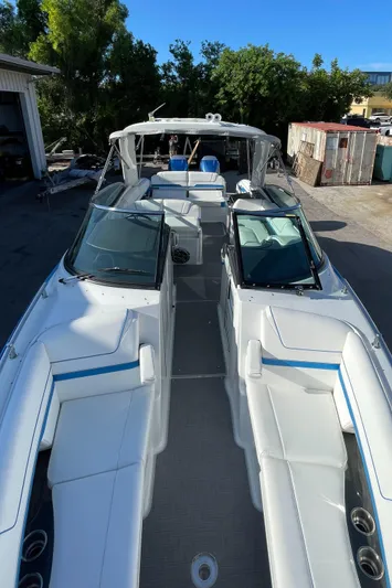  Yacht Photos Pics 2020 Formula 310 Bowrider boat with spacious seating and sleek design.