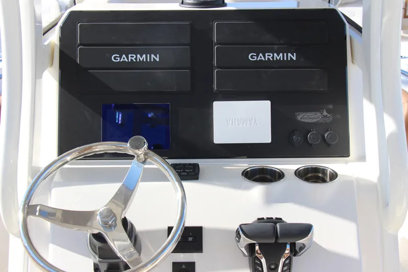  Yacht Photos Pics Steering console of 2026 Pioneer 270 Pelagic boat with Garmin displays and Yamaha controls.