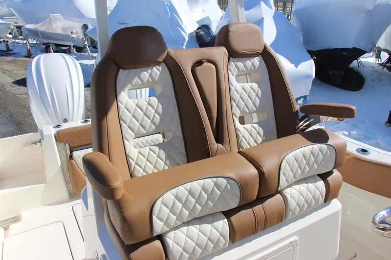  Yacht Photos Pics Luxurious seating on 2026 Pioneer 270 Pelagic boat with quilted leather upholstery.
